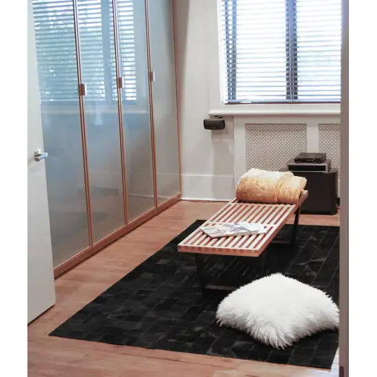 Black Cowhide Patchwork Area Rug Photo 2