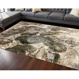 Photo of Black Dark Green And Beige Abstract Area Rug
