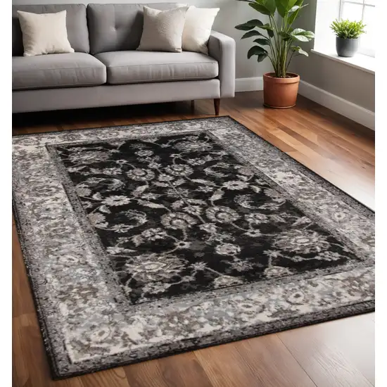 Ivory Black And Gray Oriental Area Rug Photo 1