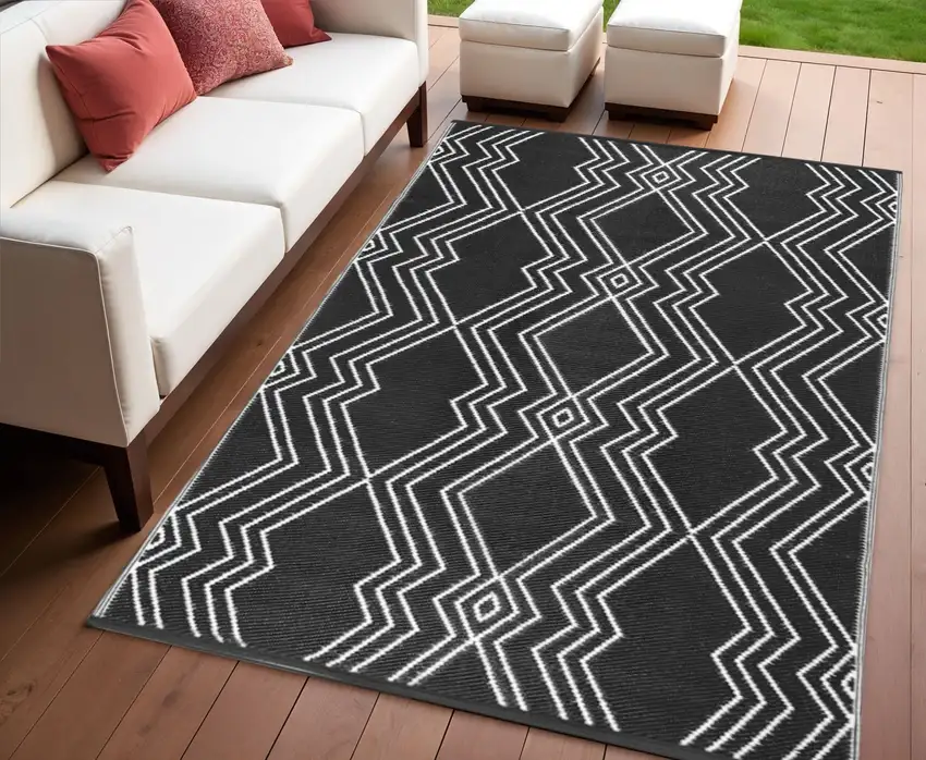 Black Geometric Machine Braided Distressed Area Rug With UV Protection Photo 1