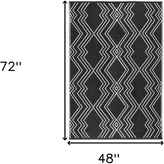 Black Geometric Machine Braided Distressed Area Rug With UV Protection Photo 3