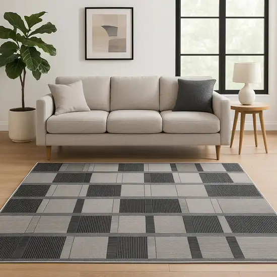 Black Geometric Power Loom Area Rug Photo 1