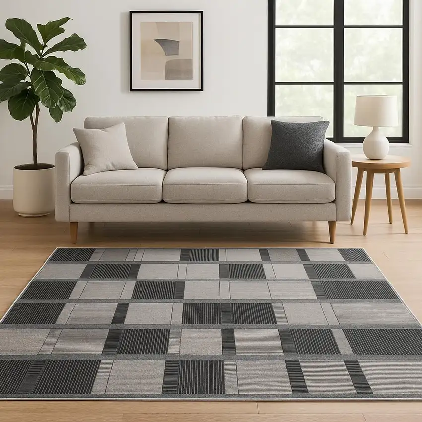 Black Geometric Power Loom Area Rug Photo 1