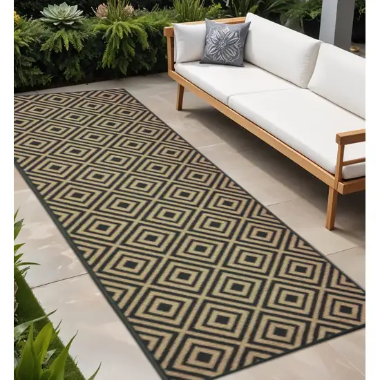 Black and Tan Geometric Stain Resistant Indoor Outdoor Area Rug Photo 1