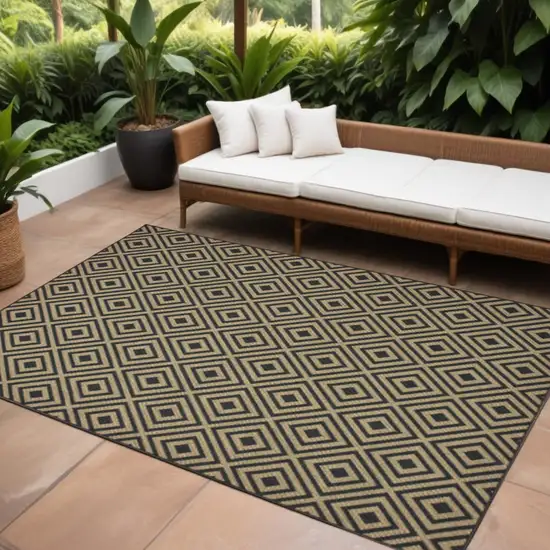Black and Tan Geometric Stain Resistant Indoor Outdoor Area Rug Photo 1