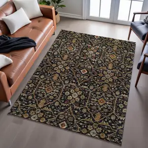 Photo of Black Gold And Blue Oriental Washable Area Rug With UV Protection