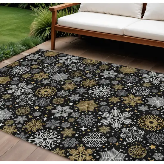 Black Gold And Gray Snowflake Washable Indoor Outdoor Area Rug Photo 1
