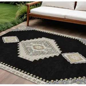Photo of Black Gold And Gray Oriental Washable Indoor Outdoor Area Rug