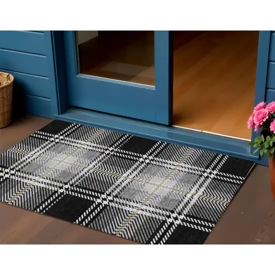 Black Gold And Gray Plaid Washable Indoor Outdoor Area Rug Photo 1