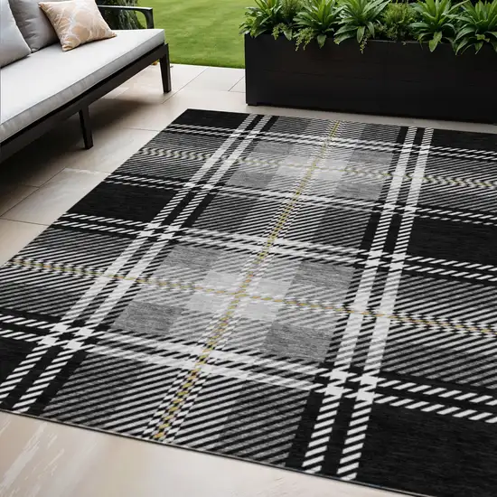 Black Gold And Gray Plaid Washable Indoor Outdoor Area Rug Photo 1