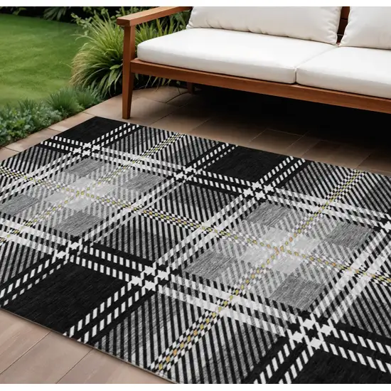 Black Gold And Gray Plaid Washable Indoor Outdoor Area Rug Photo 1