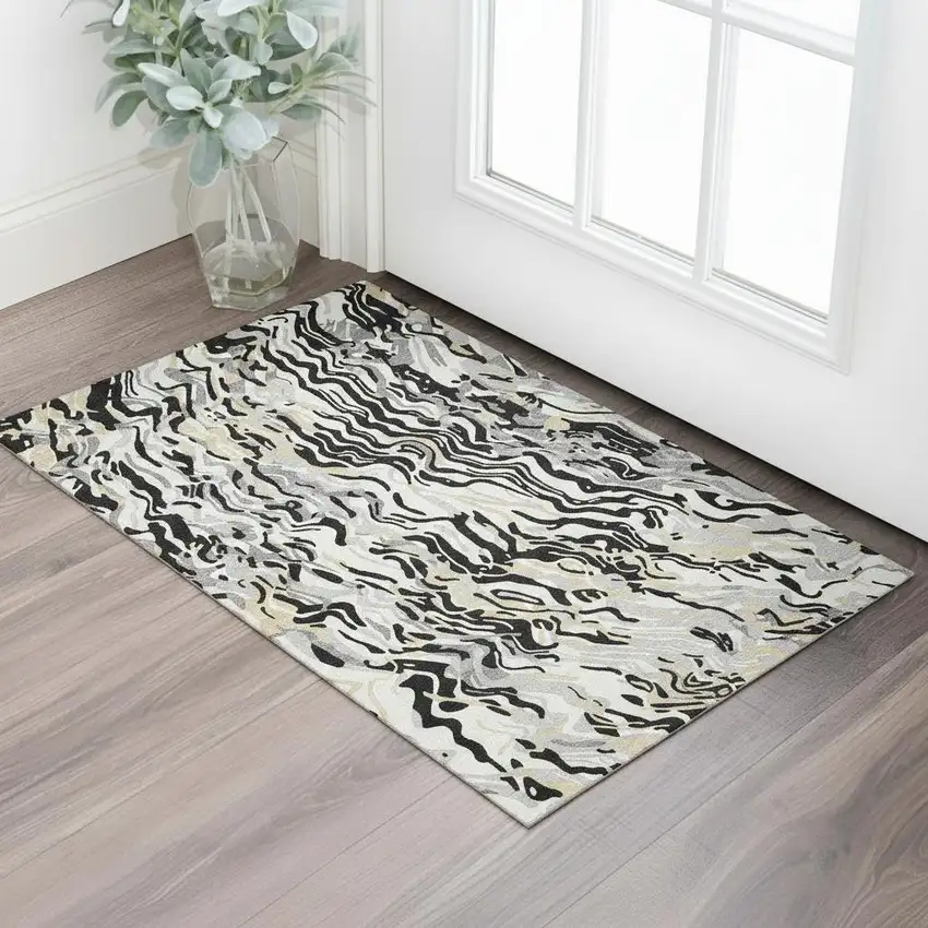 Black Gold And Ivory Abstract Washable Area Rug With UV Protection Photo 2