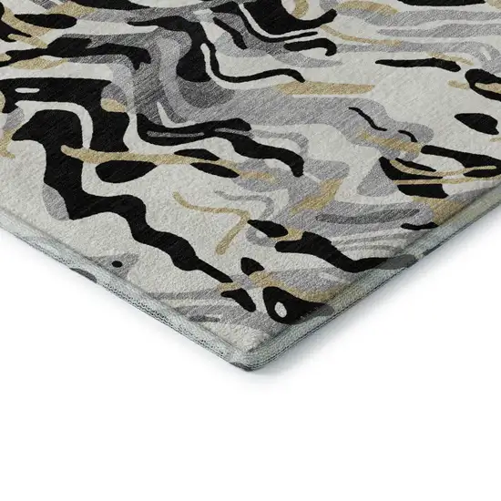 Black Gold And Ivory Abstract Washable Area Rug With UV Protection Photo 6