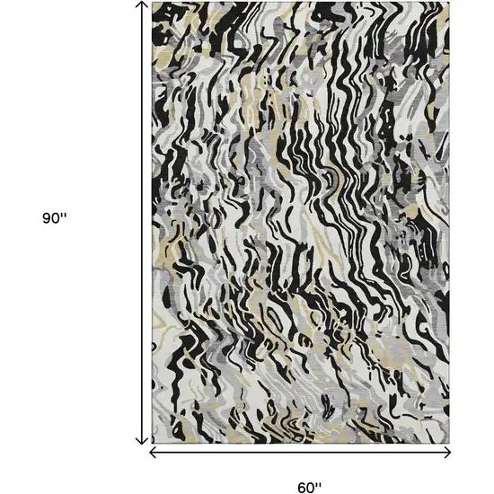 Black Gold And Ivory Abstract Washable Area Rug With UV Protection Photo 9