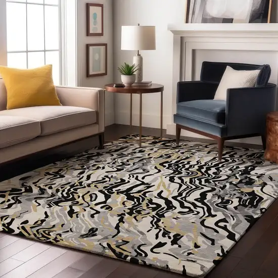 Black Gold And Ivory Abstract Washable Area Rug With UV Protection Photo 3