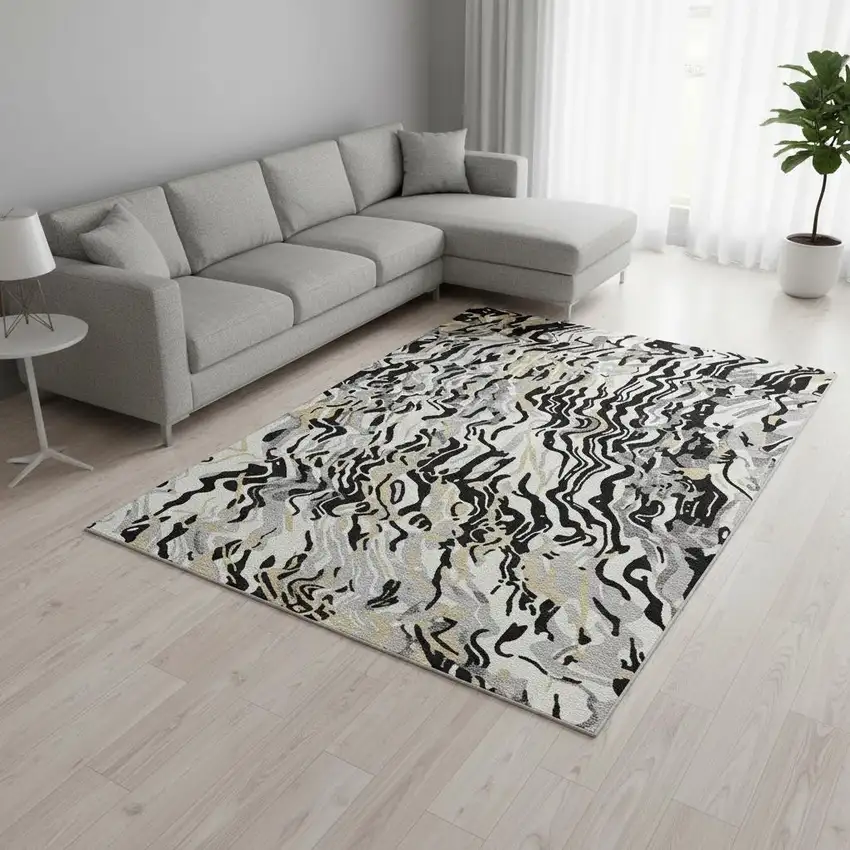 Black Gold And Ivory Abstract Washable Area Rug With UV Protection Photo 2