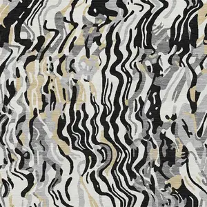 Photo of Black Gold And Ivory Abstract Washable Area Rug With UV Protection