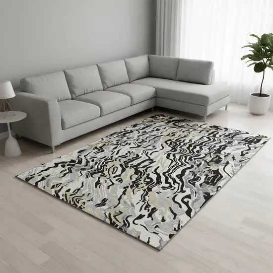 Black Gold And Ivory Abstract Washable Area Rug With UV Protection Photo 2