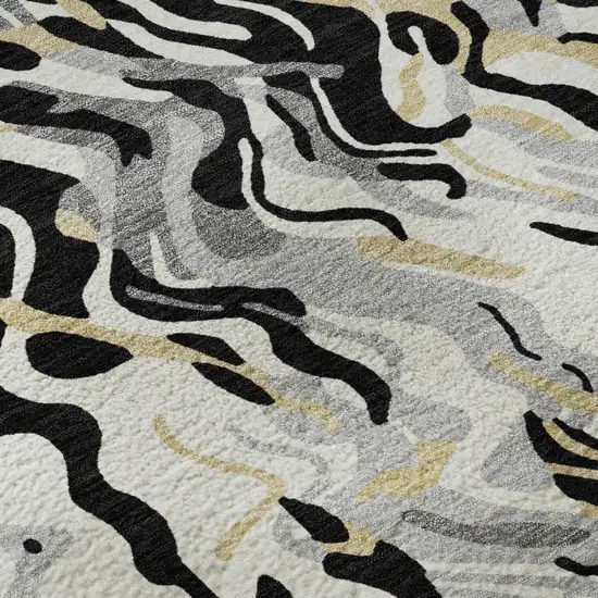Black Gold And Ivory Abstract Washable Area Rug With UV Protection Photo 9