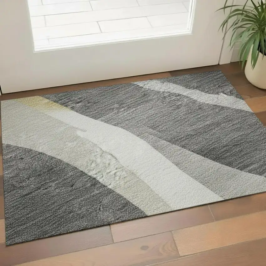 Black Gold And Ivory Abstract Washable Area Rug With UV Protection Photo 2
