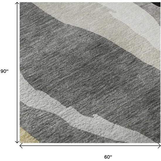 Black Gold And Ivory Abstract Washable Area Rug With UV Protection Photo 8