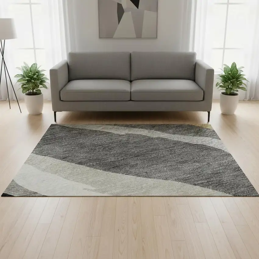 Black Gold And Ivory Abstract Washable Area Rug With UV Protection Photo 2