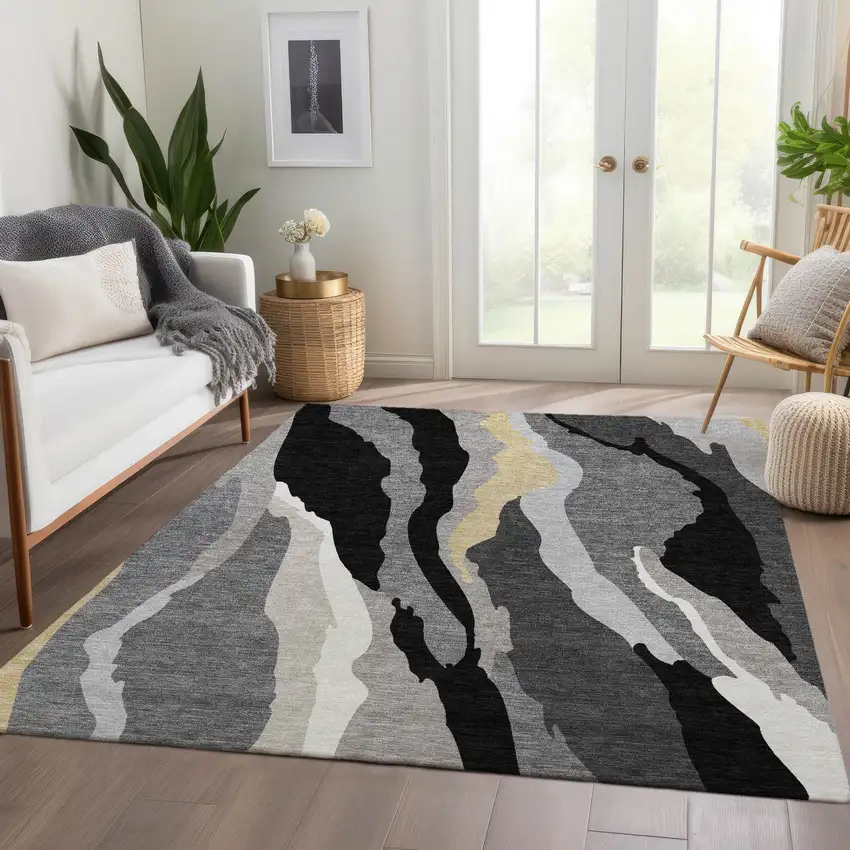 Black Gold And Ivory Abstract Washable Area Rug With UV Protection Photo 3