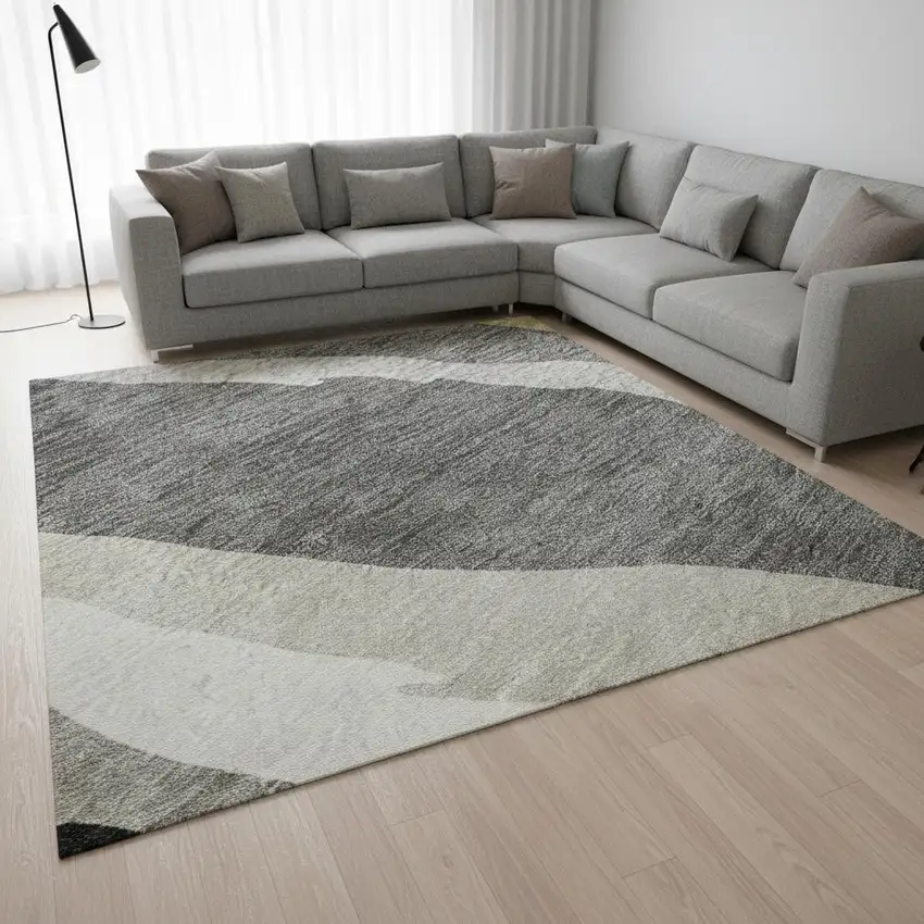 Black Gold And Ivory Abstract Washable Area Rug With UV Protection Photo 2