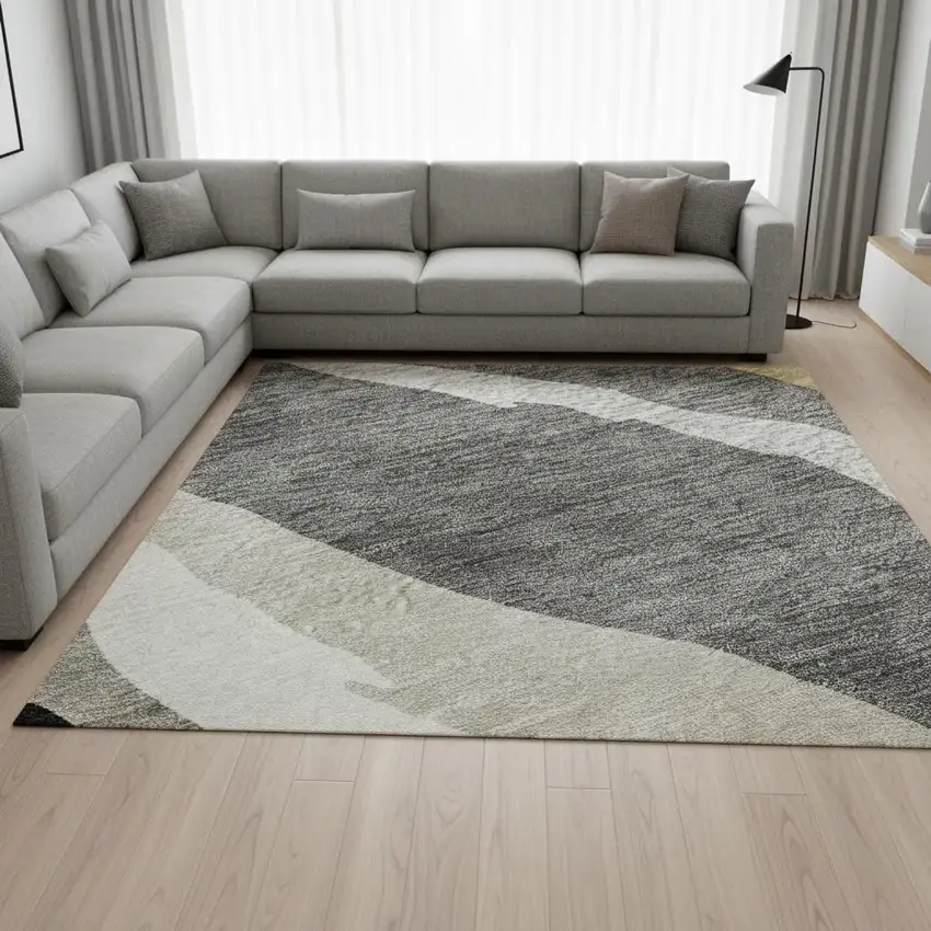 Black Gold And Ivory Abstract Washable Area Rug With UV Protection Photo 2