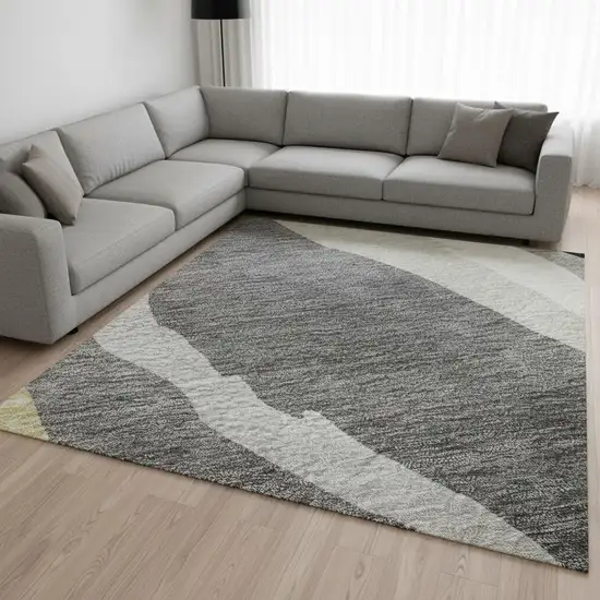 Black Gold And Ivory Abstract Washable Area Rug With UV Protection Photo 2