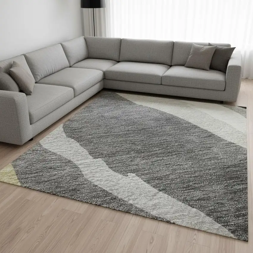 Black Gold And Ivory Abstract Washable Area Rug With UV Protection Photo 2