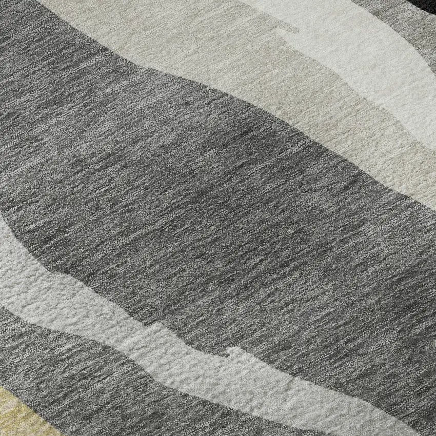 Black Gold And Ivory Abstract Washable Area Rug With UV Protection Photo 1