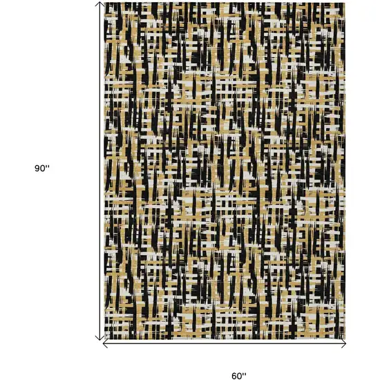 Black Gold And Ivory Abstract Washable Indoor Outdoor Area Rug Photo 7