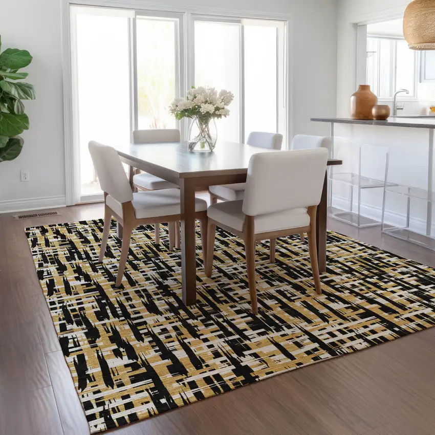 Black Gold And Ivory Abstract Washable Indoor Outdoor Area Rug Photo 9