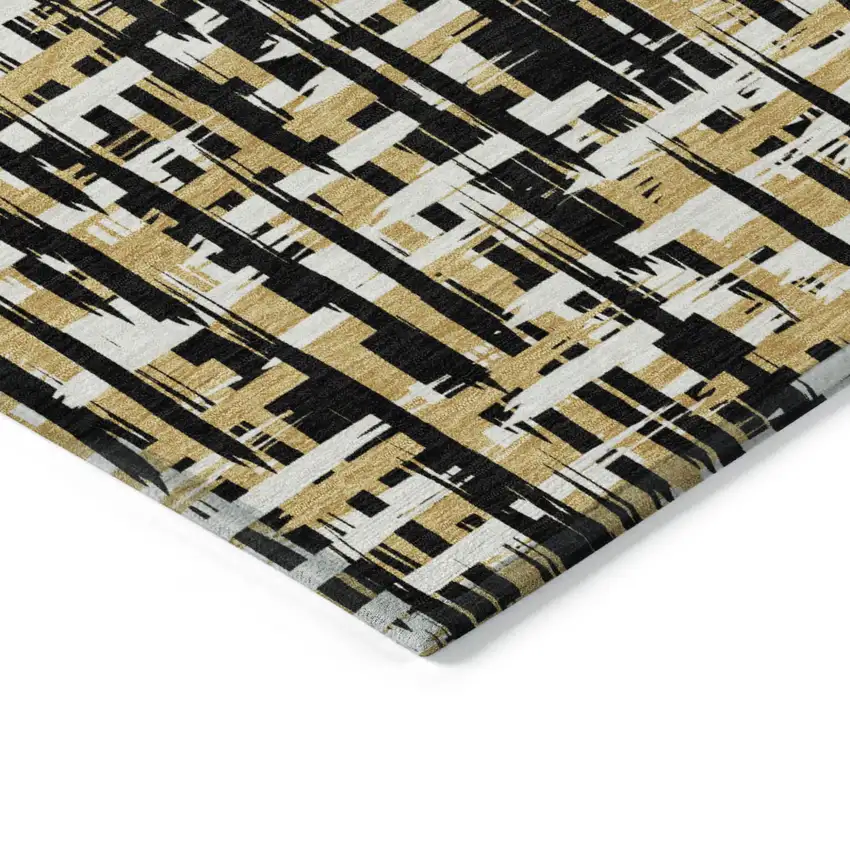 Black Gold And Ivory Abstract Washable Indoor Outdoor Area Rug Photo 4