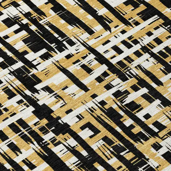Black Gold And Ivory Abstract Washable Indoor Outdoor Area Rug Photo 5