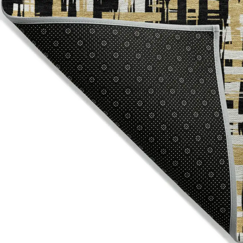 Black Gold And Ivory Abstract Washable Indoor Outdoor Area Rug Photo 3