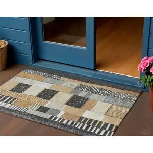 Photo of Black Gold And Ivory Geometric Washable Indoor Outdoor Area Rug