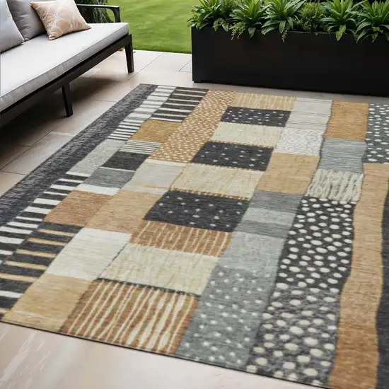 Black Gold And Ivory Geometric Washable Indoor Outdoor Area Rug Photo 2