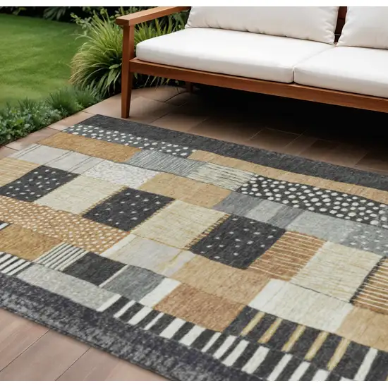 Black Gold And Ivory Geometric Washable Indoor Outdoor Area Rug Photo 2