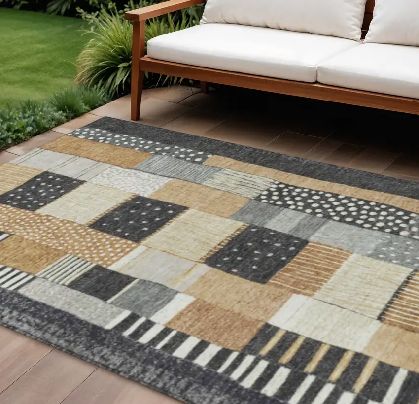 Black Gold And Ivory Geometric Washable Indoor Outdoor Area Rug Photo 2
