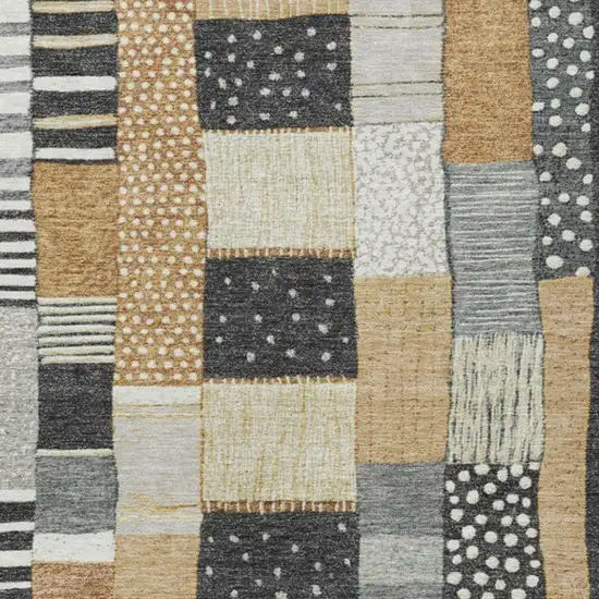 Black Gold And Ivory Geometric Washable Indoor Outdoor Area Rug Photo 3