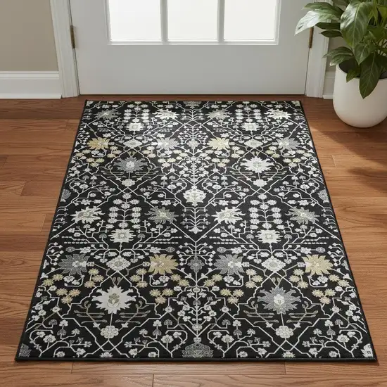 Black Gold And Ivory Oriental Washable Area Rug With UV Protection Photo 2