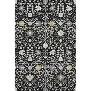 Photo of Black Gold And Ivory Oriental Washable Area Rug With UV Protection