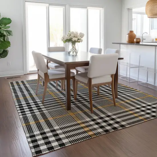Black Gold And Ivory Plaid Washable Indoor Outdoor Area Rug Photo 9