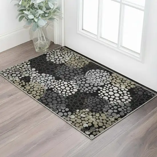 Black Gold And Ivory Polka Dot Washable Area Rug With UV Protection Photo 2