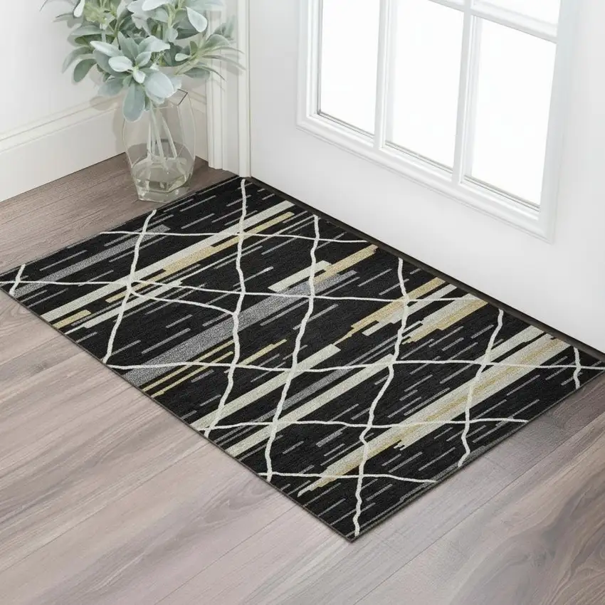 Black Gold And Ivory Striped Washable Area Rug With UV Protection Photo 2