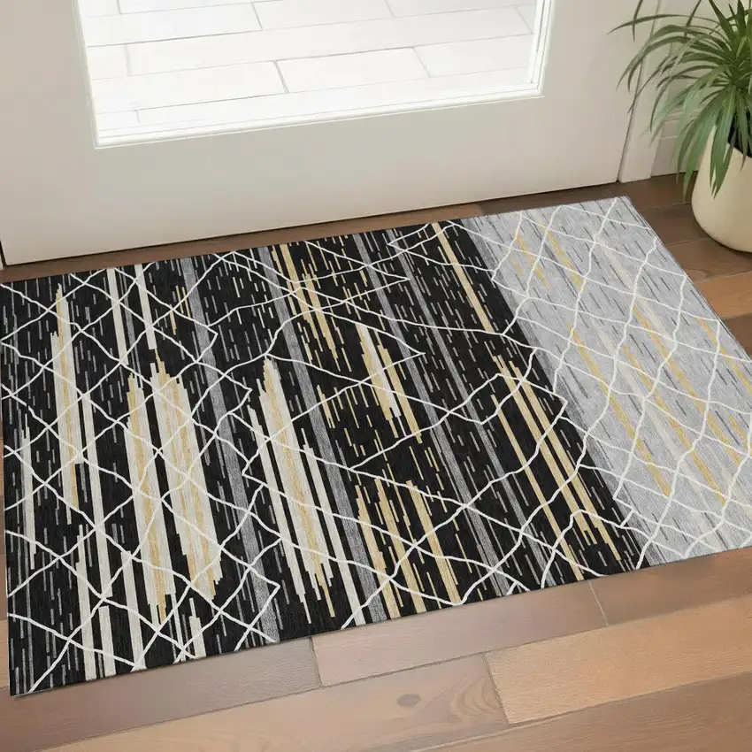 Black Gold And Ivory Striped Washable Area Rug With UV Protection Photo 1