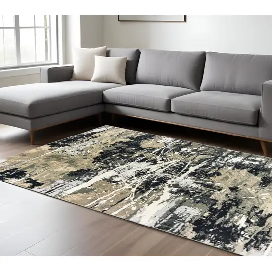 Black And Gold Abstract Area Rug Photo 1