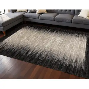 Photo of Black Gray And Beige Abstract Area Rug
